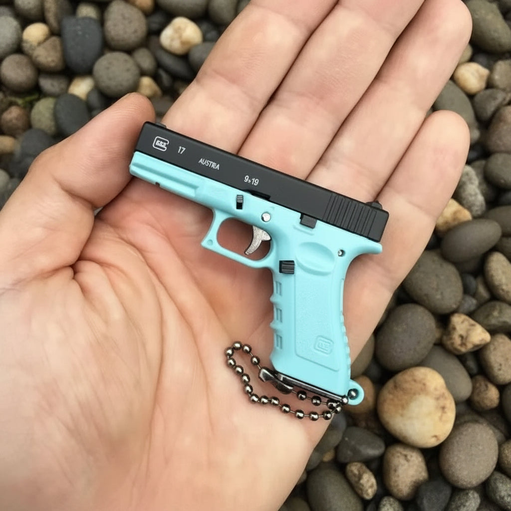 Mini Metal Pistol Keychain – Realistic Collectible Toy