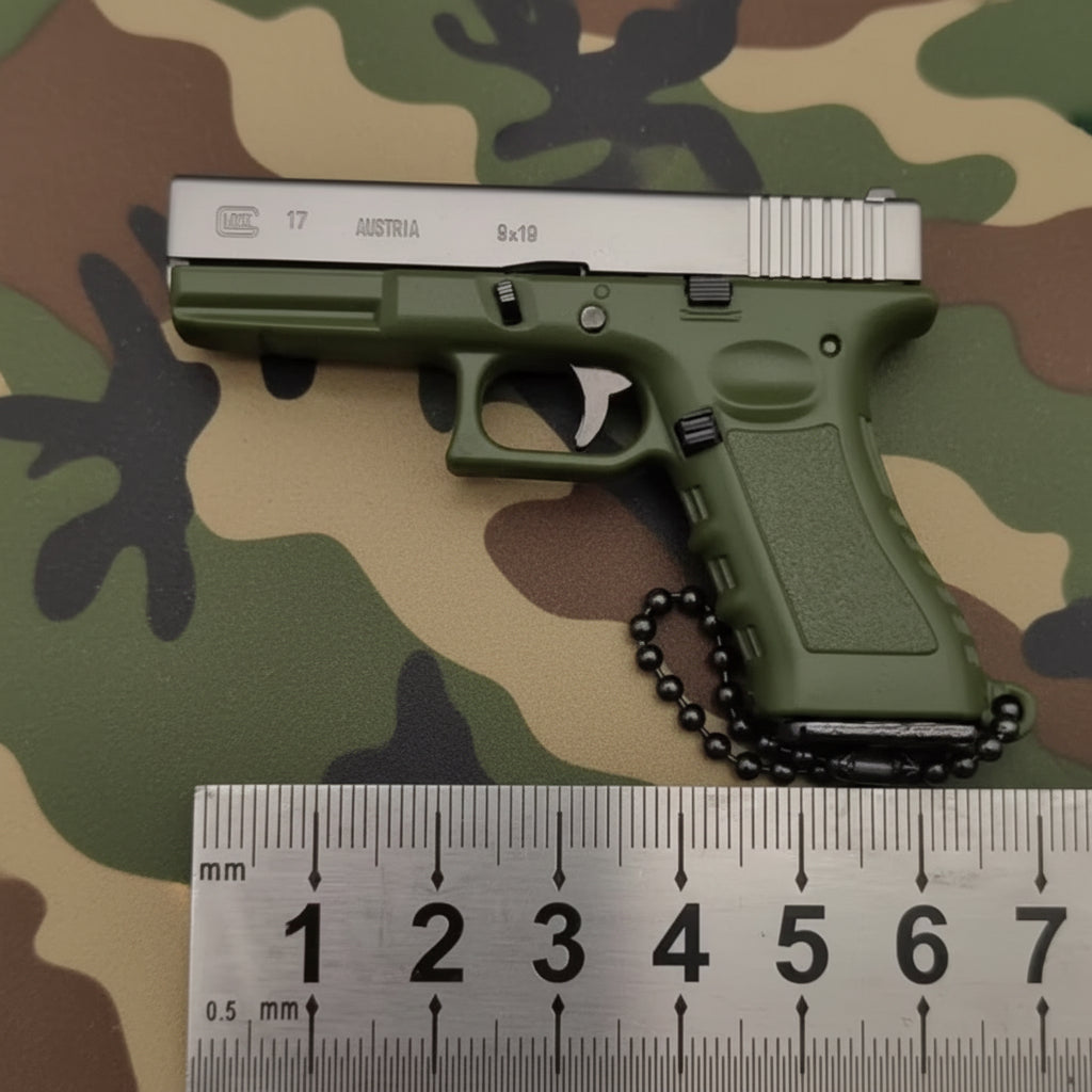 Mini Metal Pistol Keychain – Realistic Collectible Toy