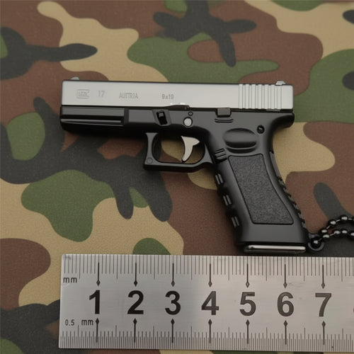 Mini Metal Pistol Keychain – Realistic Collectible Toy