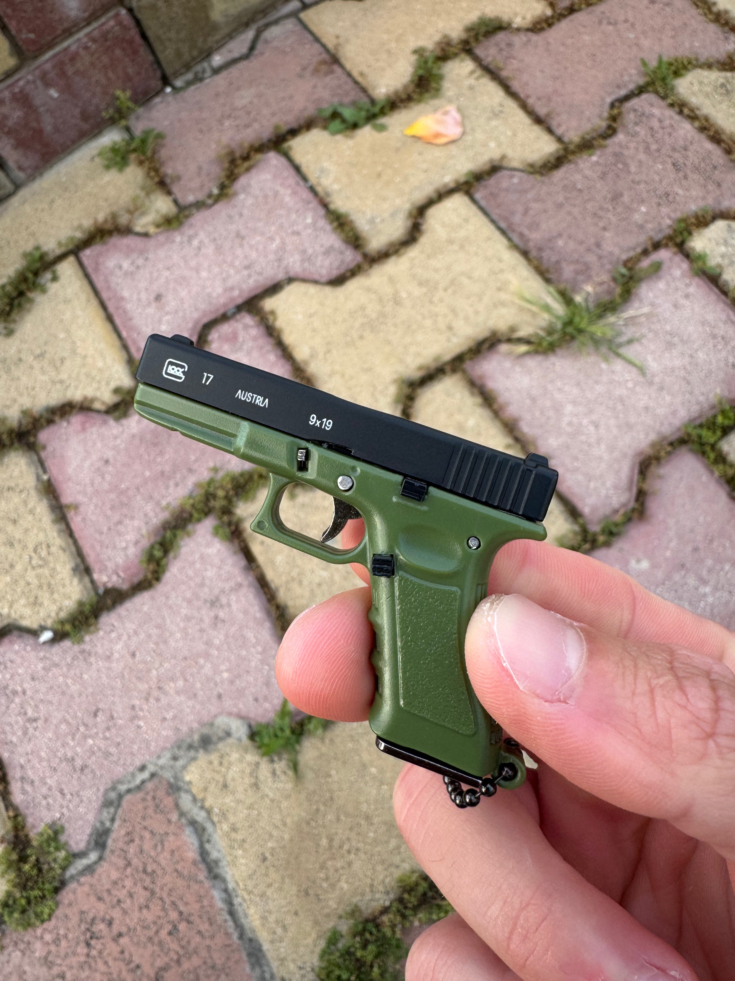 Mini Metal Pistol Keychain – Realistic Collectible Toy